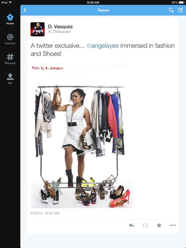 Tweet showing a clothing rack with dresses and a collection of colorful high heel shoes arranged below.