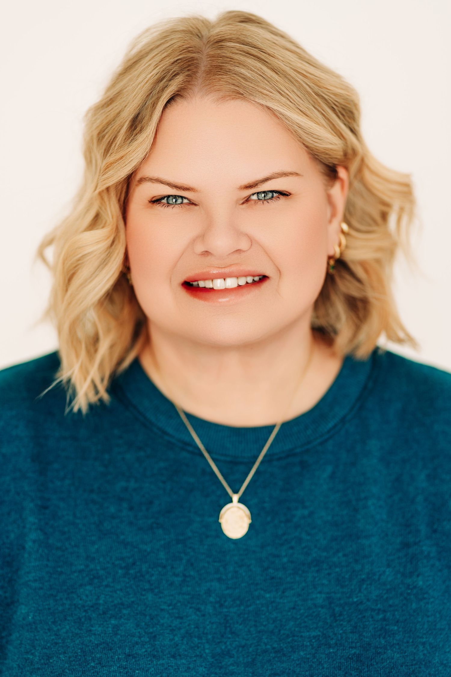 A series of close-up headshots showing a woman in a teal sweater with blonde hair and bright smile.