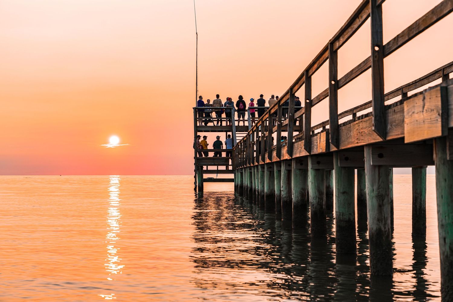 A scenic sunset photo at a team building event at the beach