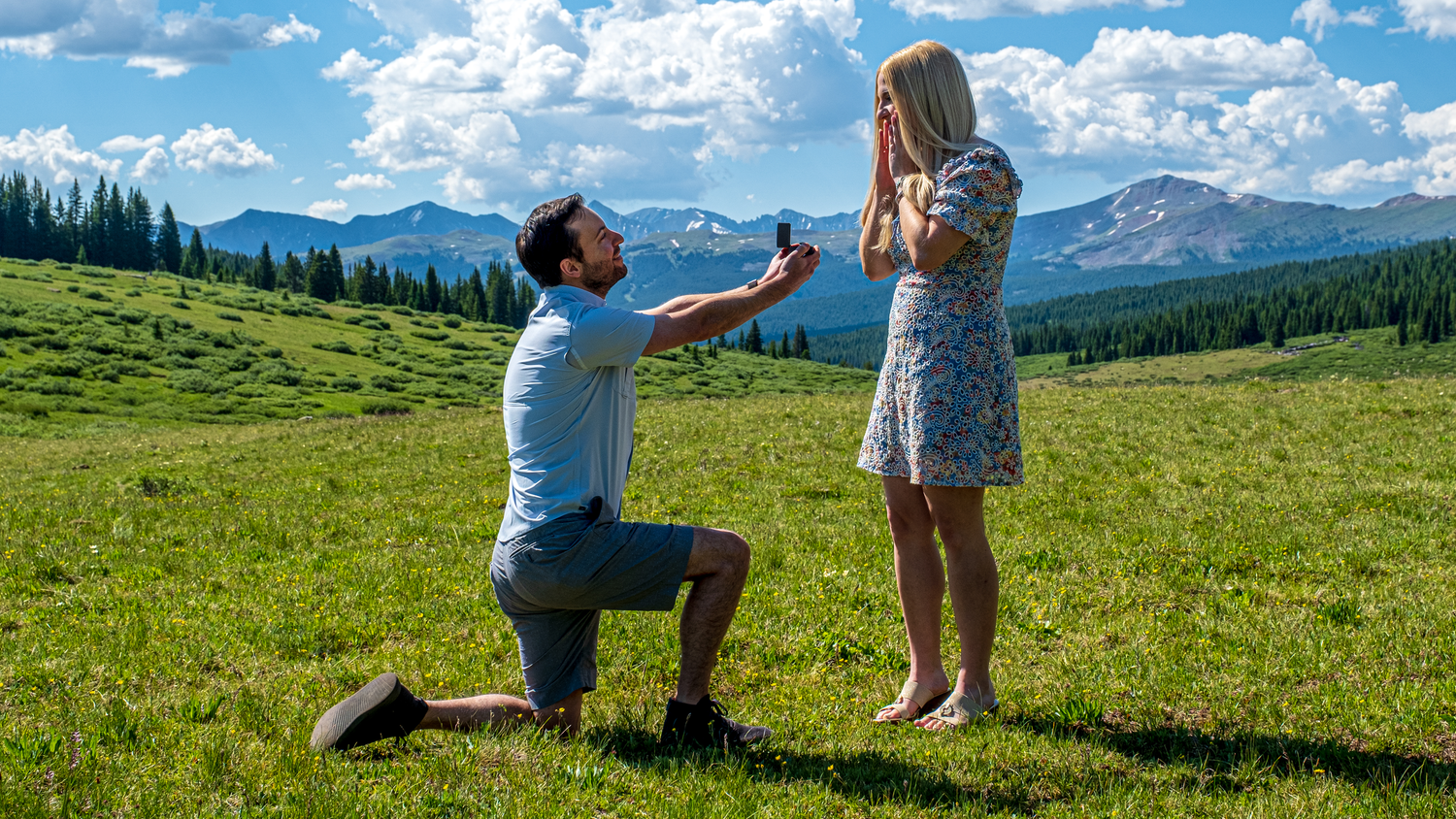 Atop Vail Pass, near Vail, CO. Marriage proposal photographed by hidden photographer.