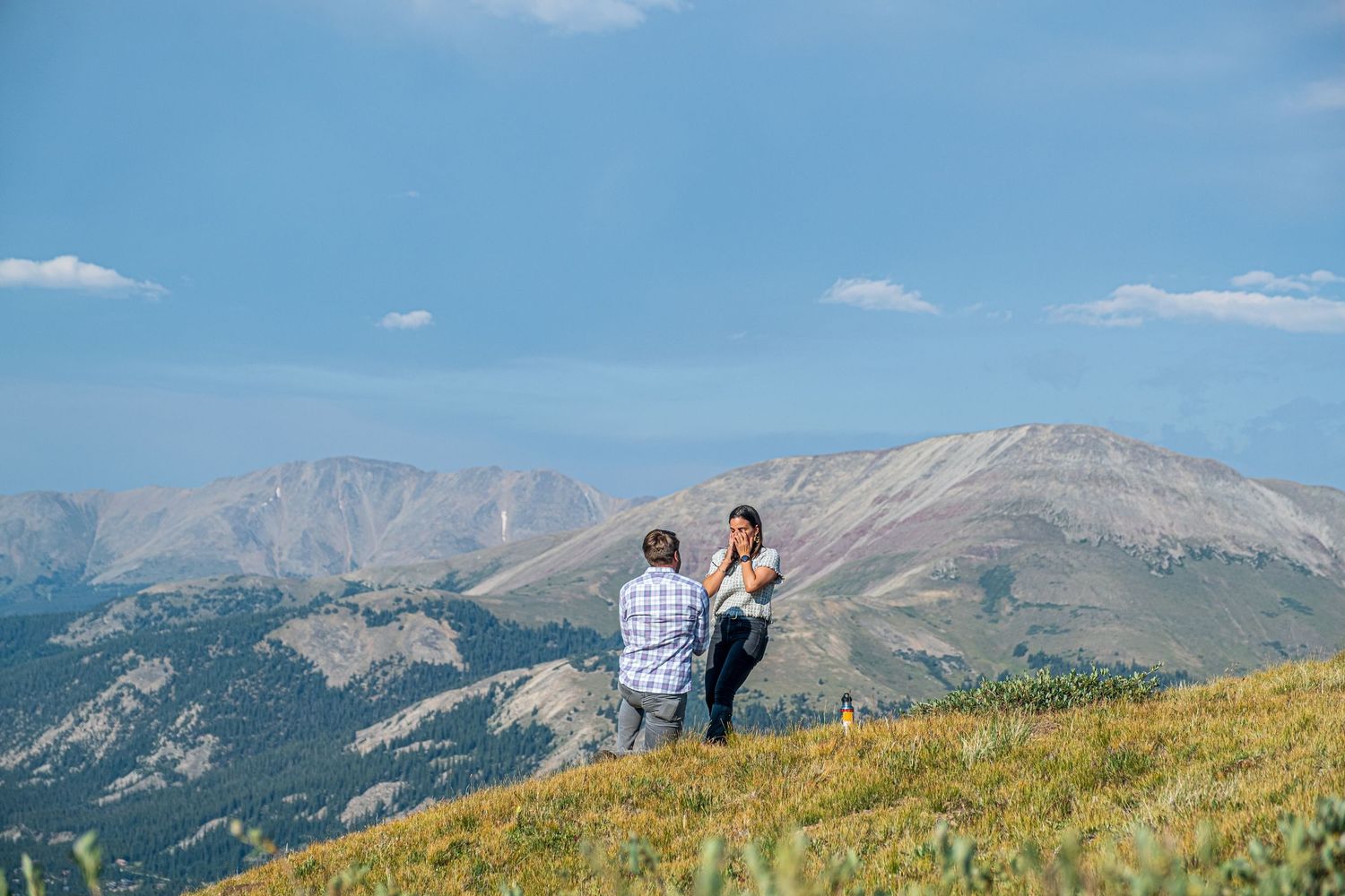 Romantic proposal captured at high elevation on North Star Mountain outside Breckenridge, Colorado