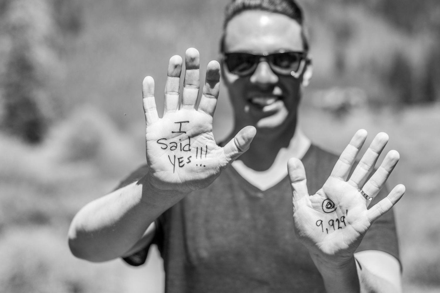 Showing of his hands after he said yes to their same sex marriage proposal in Breckenridge, CO. Hidden photographer captured all the smiles