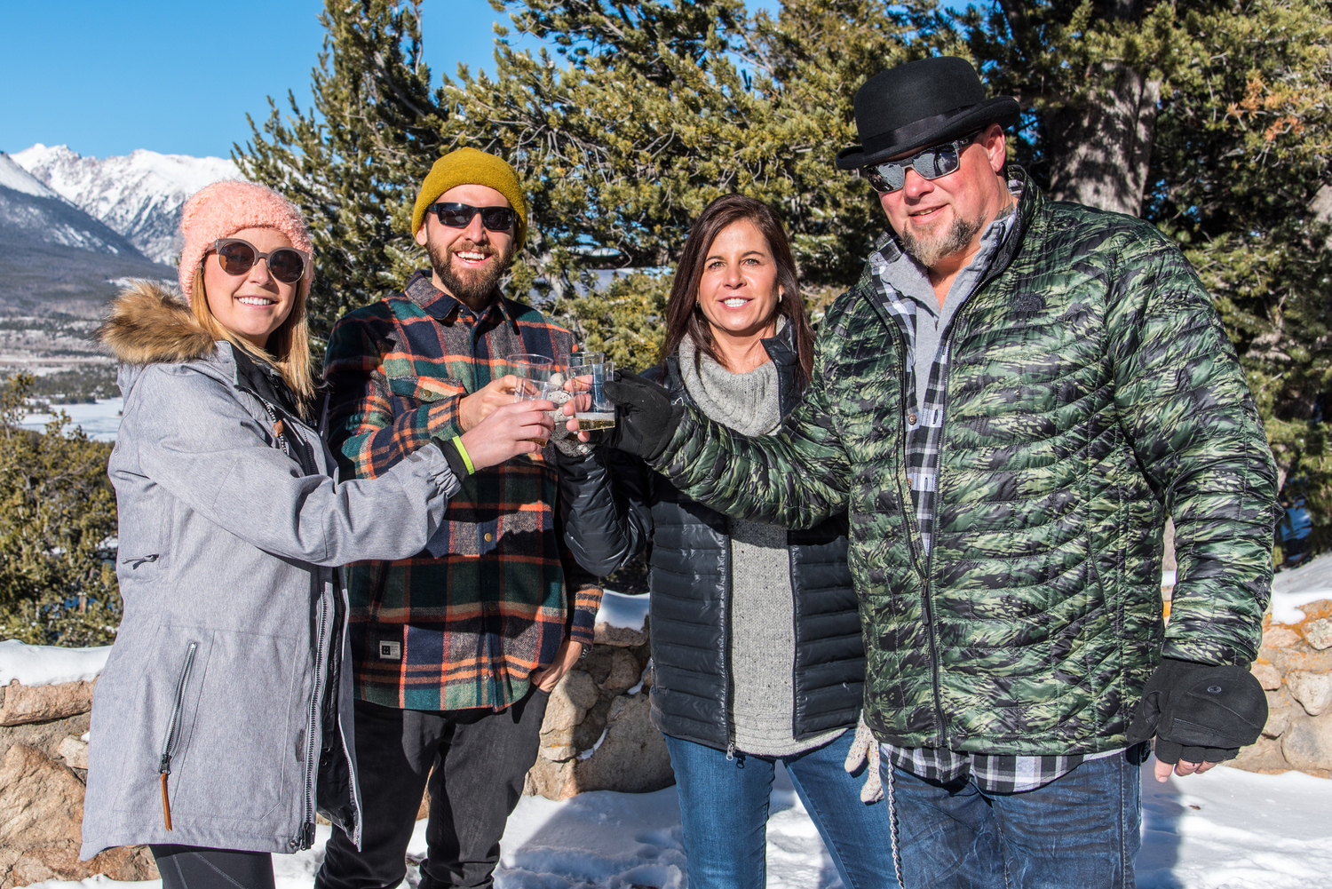 Family celebrates this couples engagement at Sapphire Point Overlook near Breckenridge, CO.