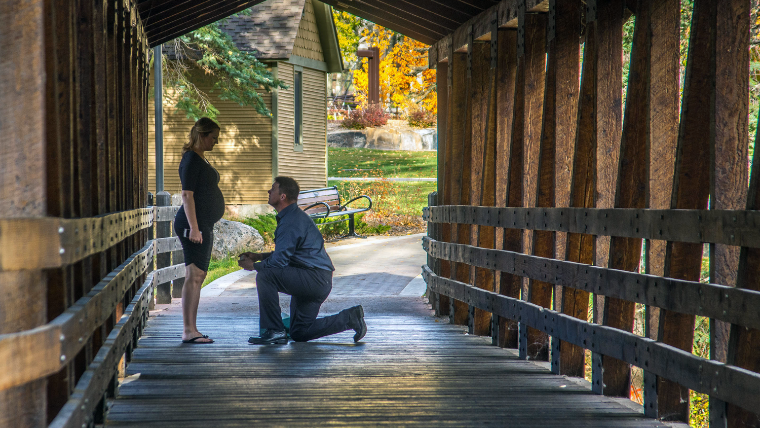 Covered bridge marriage proposal in Vail, CO