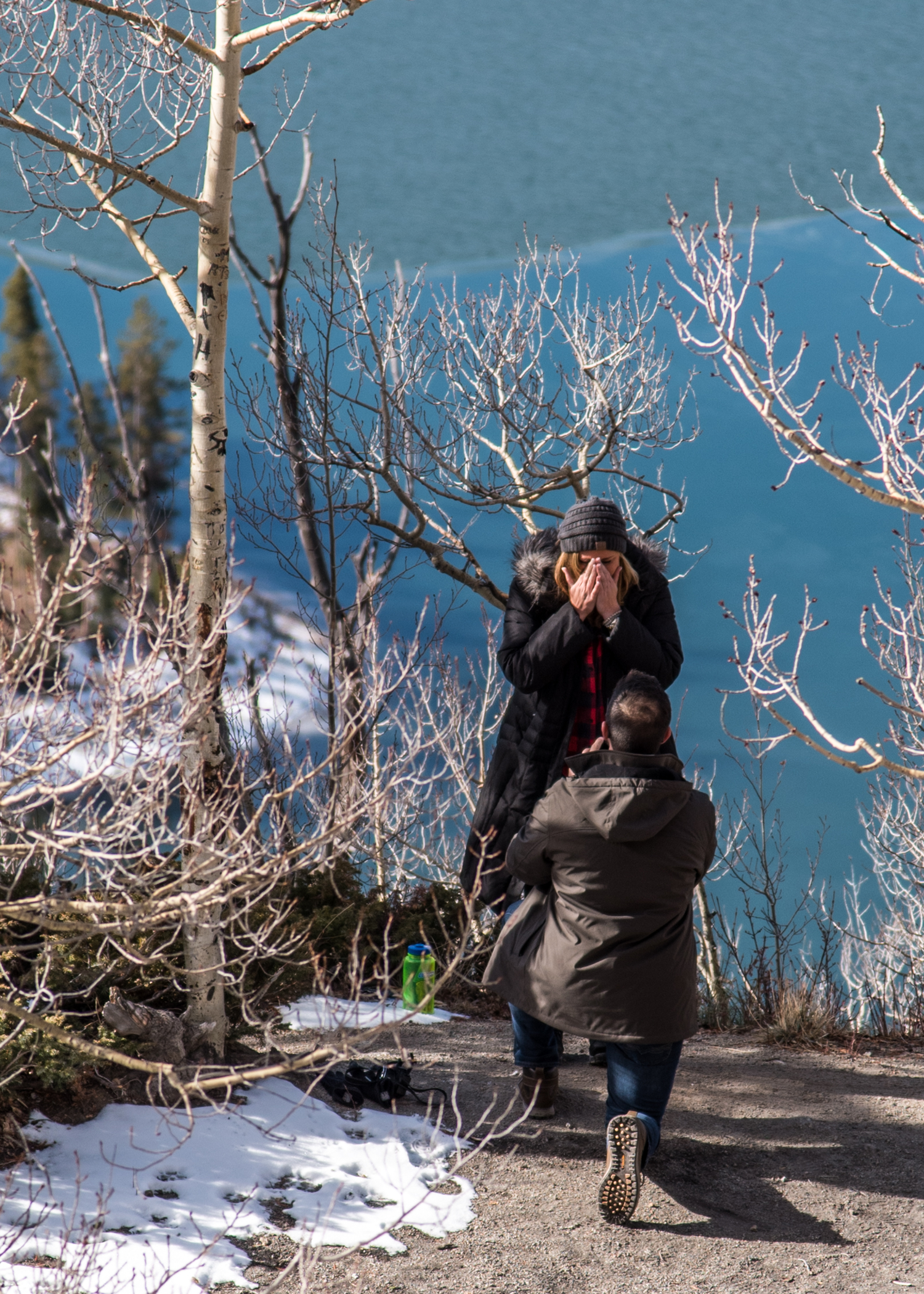 Third of three images showing the surprise reaction to a marriage proposal photographed in Breckenridge, CO.