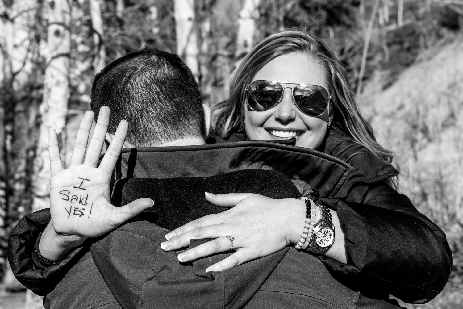 Nicole showing off her I SAID YES hand after she was surprised by Cody's marriage proposal in Breckenridge, CO