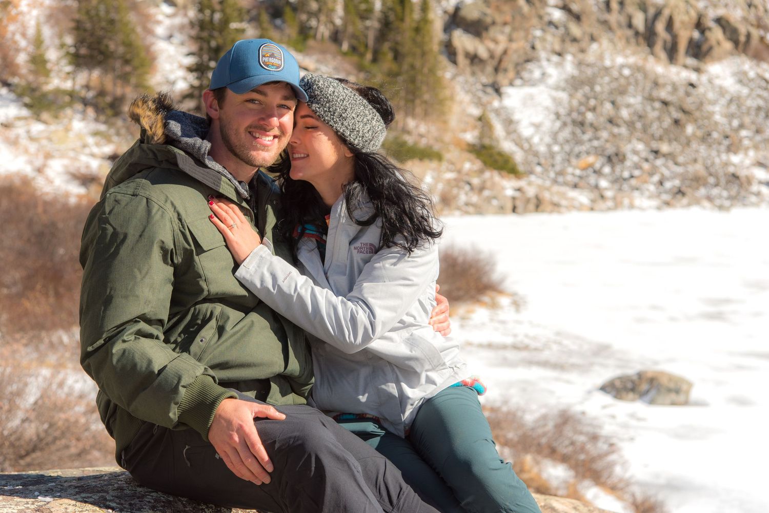 Couple embracing after their surprise marriage proposal near Breckenridge, CO (Mohawk Lakes)