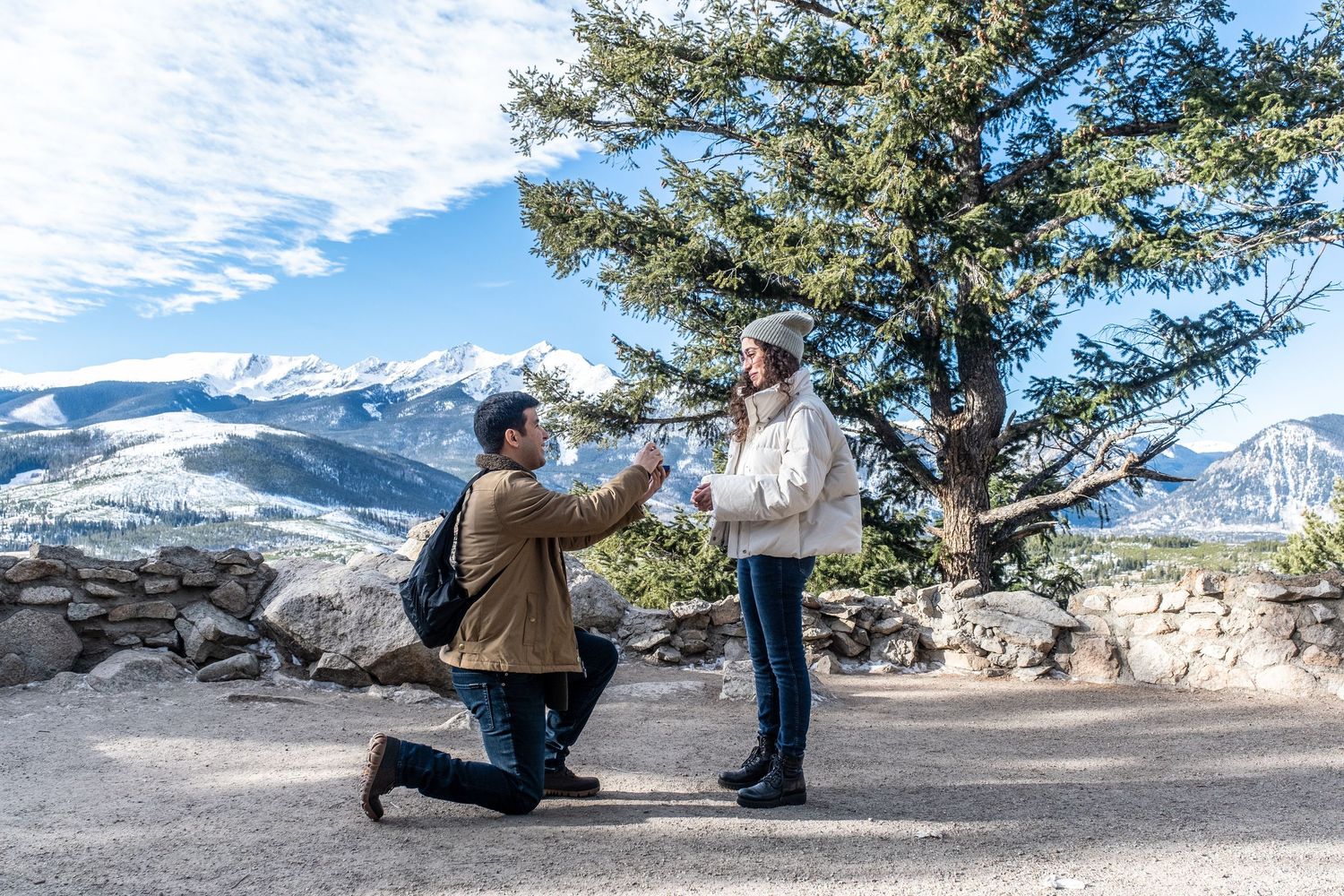 Late spring surprise marriage proposal at Sapphire Point Overlook, Colorado, captured discreetly by hidden proposal photographer.
