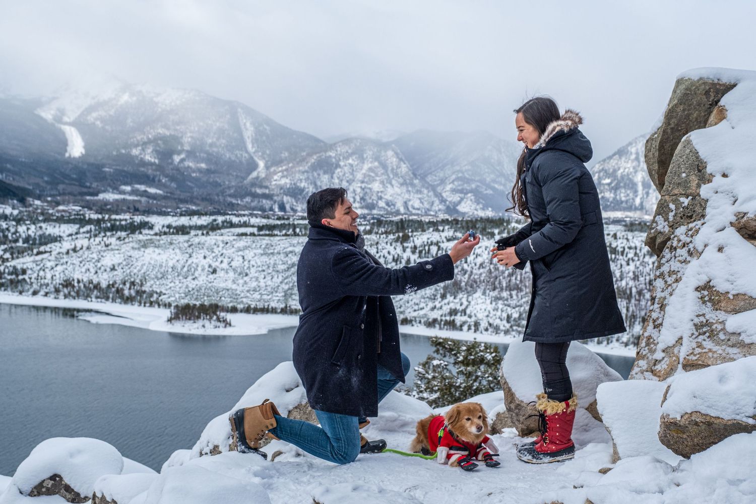 Marriage proposal at Sapphire Point Overlook near Breckenridge Colorado captured by a hidden photographer (winter)