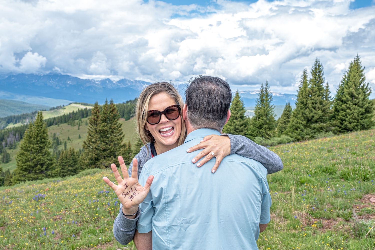 I said yes hand photographed after marriage proposal near Vail, CO (summer)