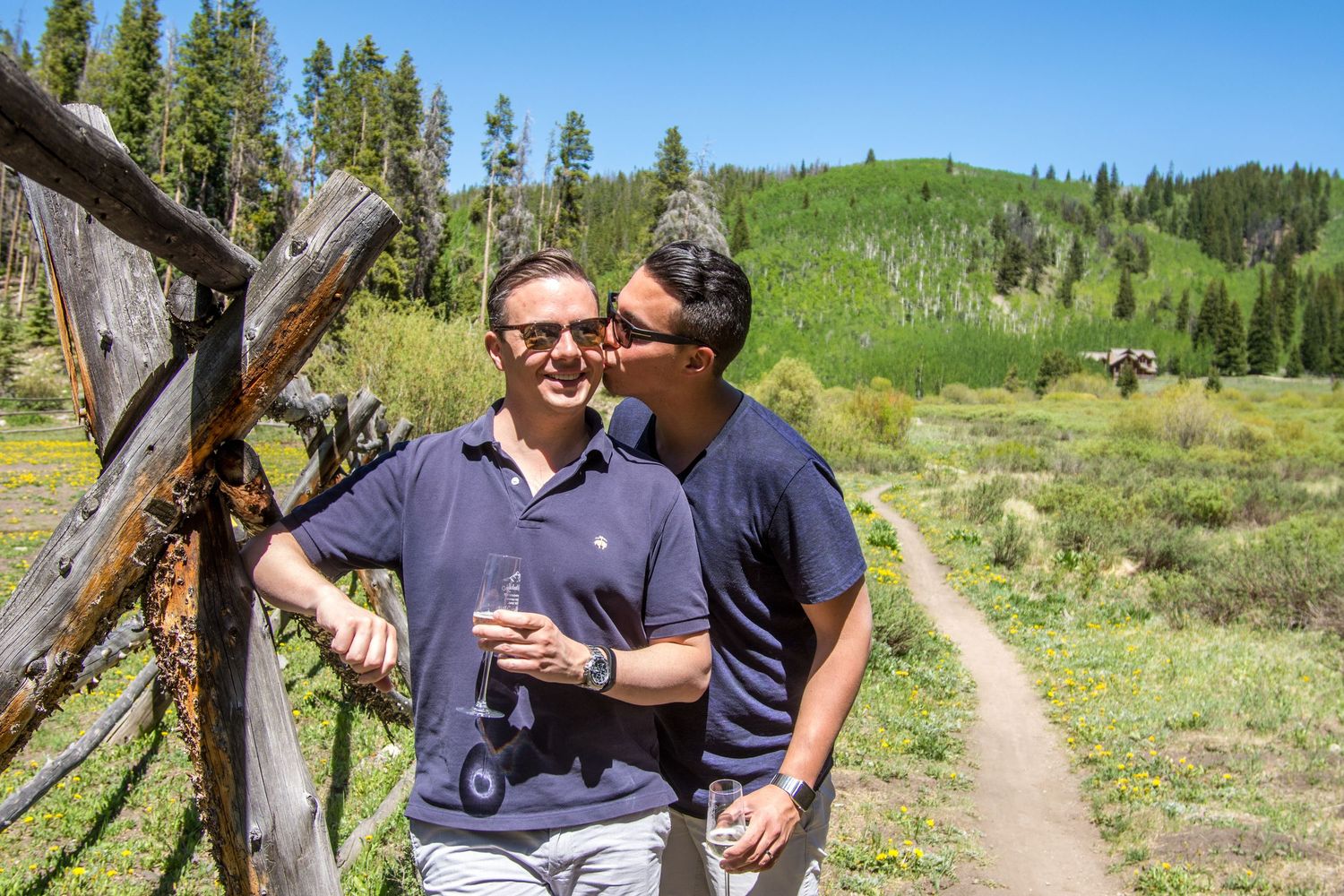 Time to celebrate this same sex marriage proposal. Champagne and smiles for everyone.