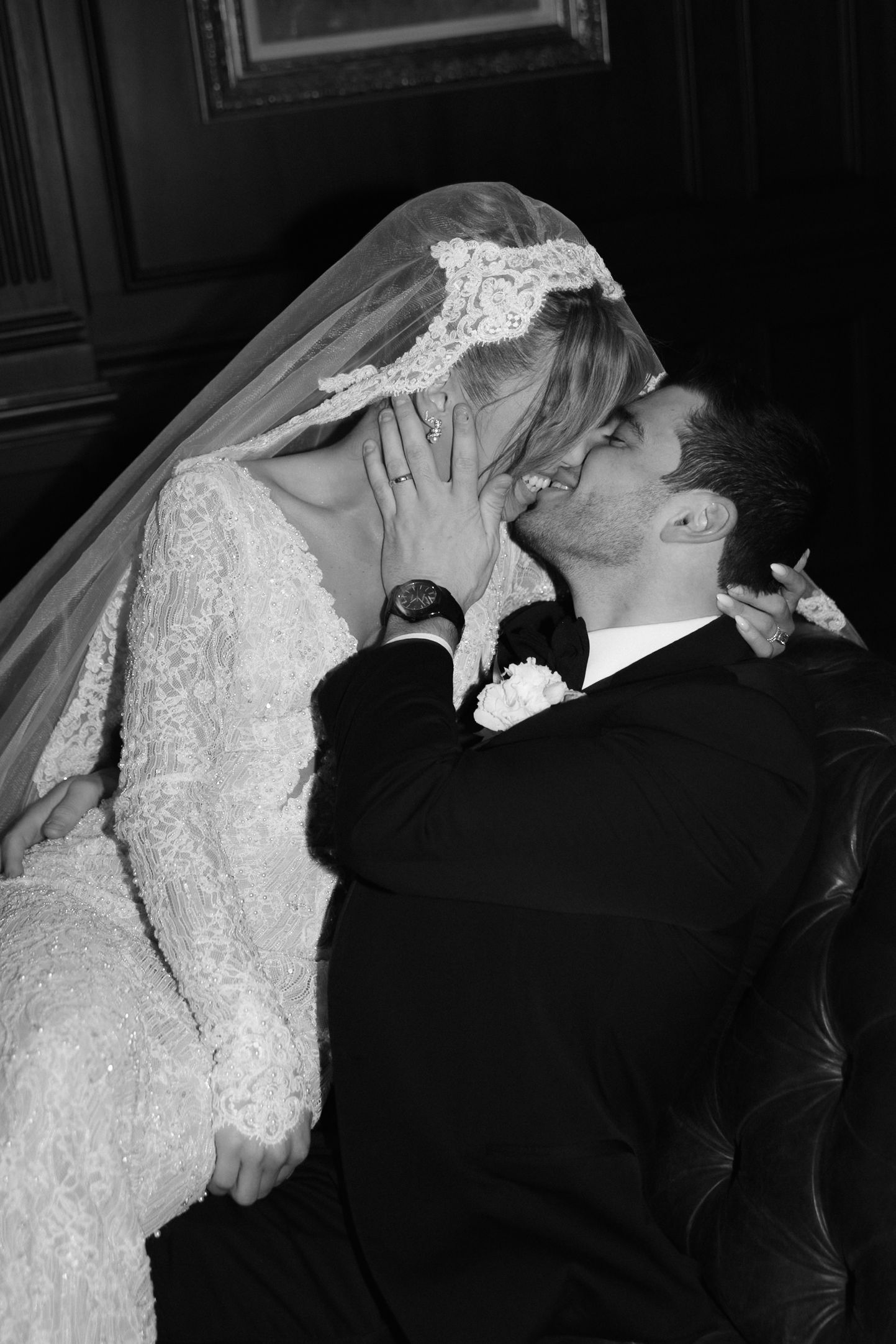 A romantic sequence of black and white wedding photos showing a couple embracing and kissing in formal attire.
