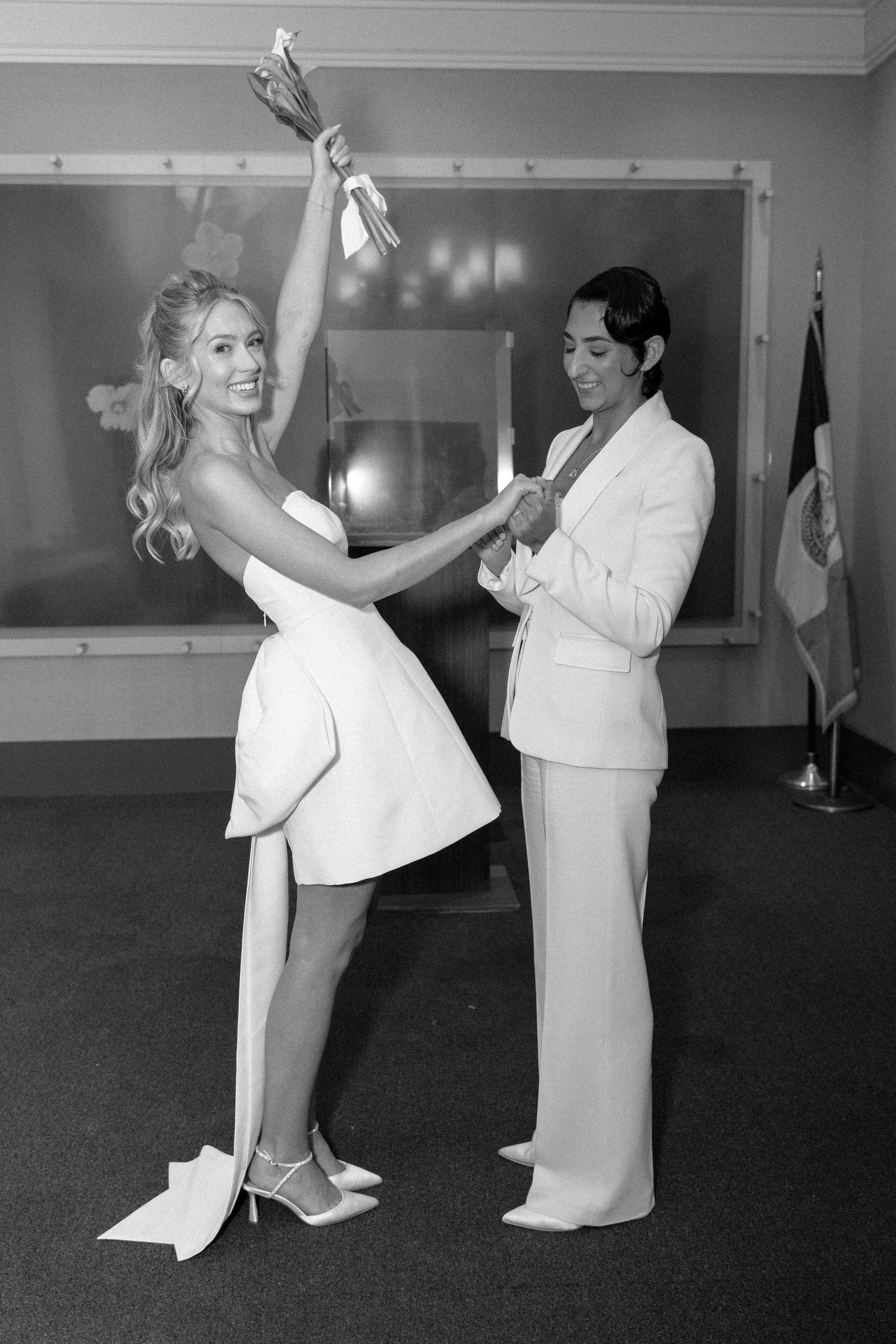 A sequence of black and white photos shows two dancers performing a romantic ballroom dance routine together.
