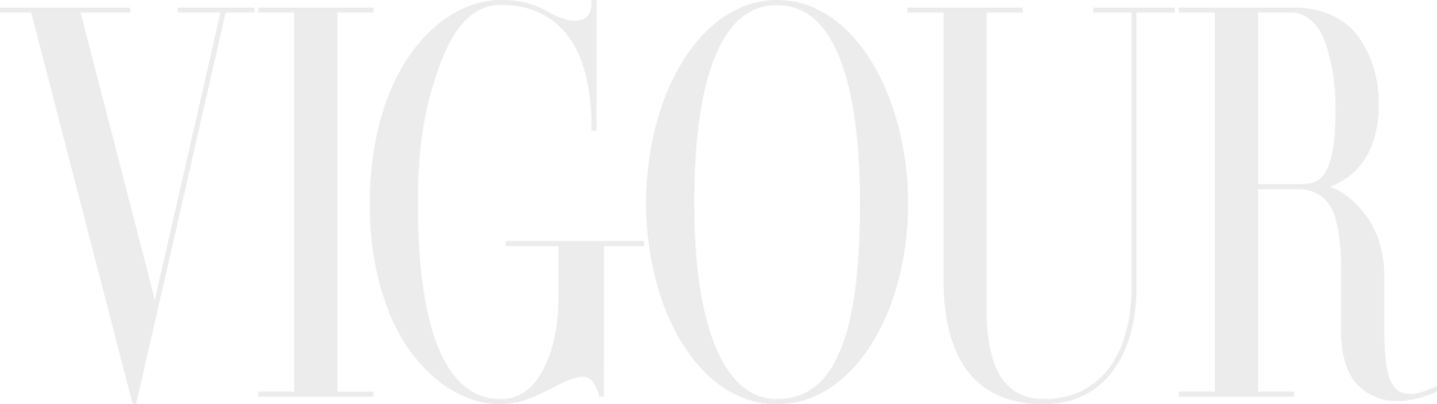 Vigour magazine logo in elegant serif typography displayed in light gray on white background.