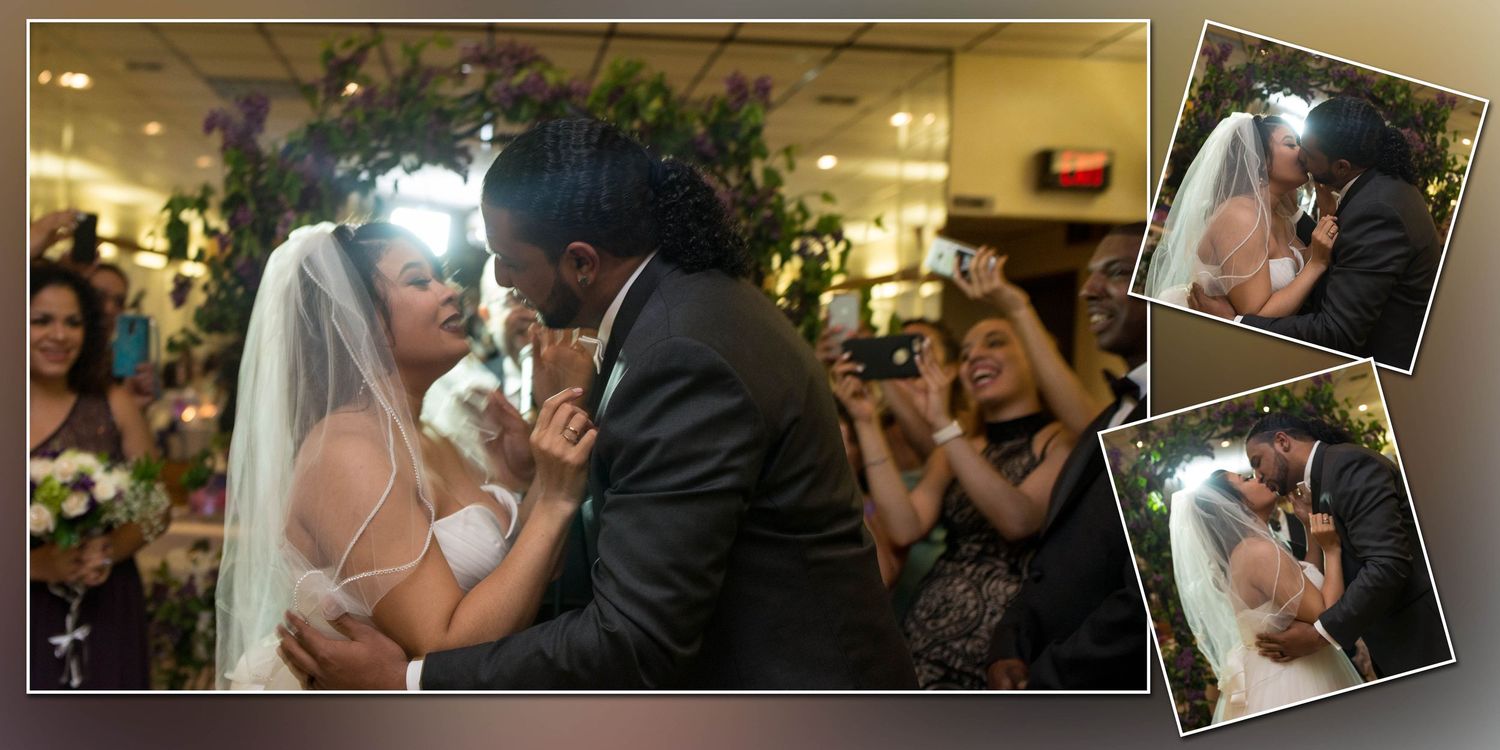 Bride and groom sharing their first dance surrounded by guests at reception