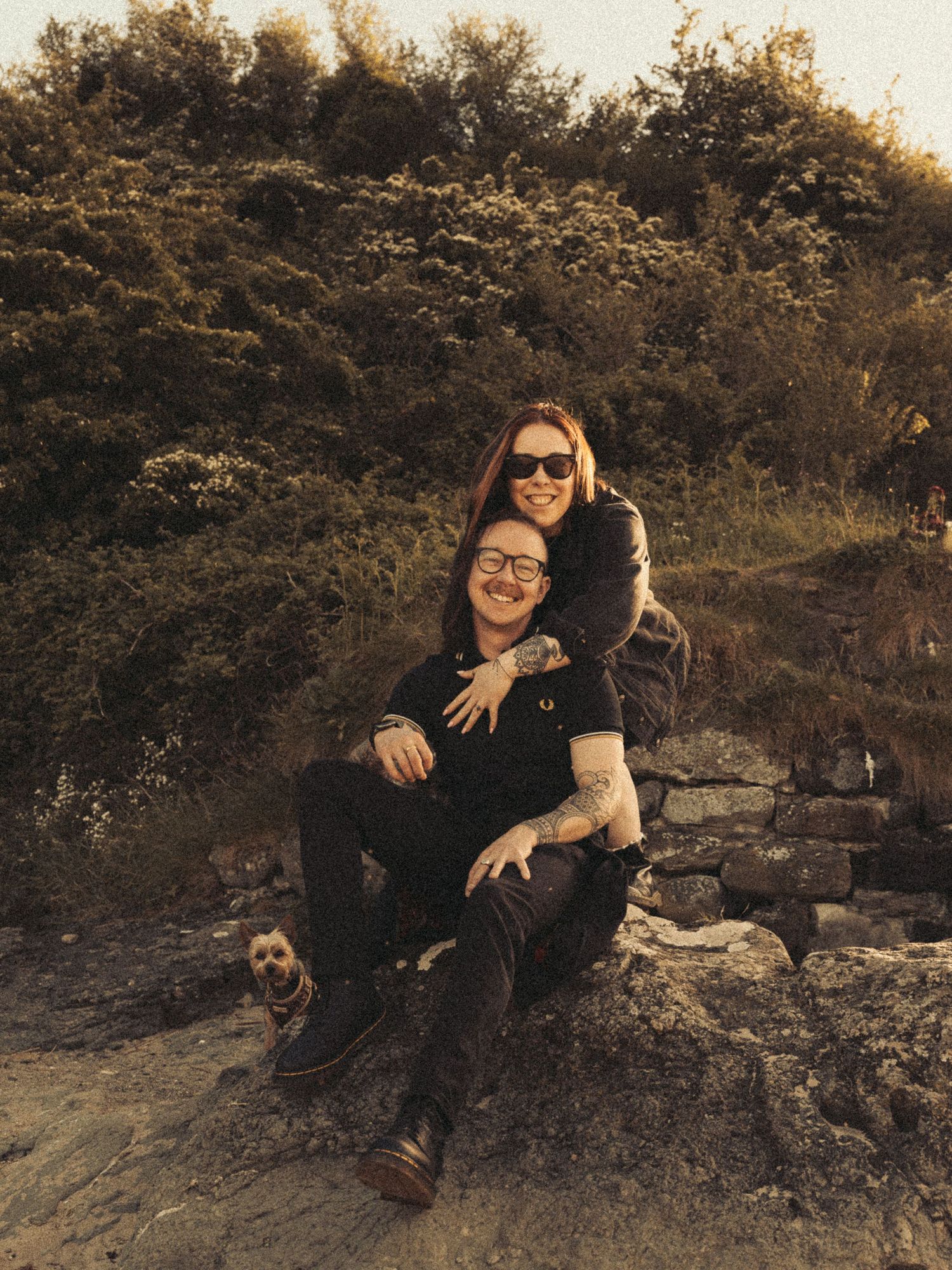 Beach engagement shoot, alternative couple. Doc martens and tattoos.