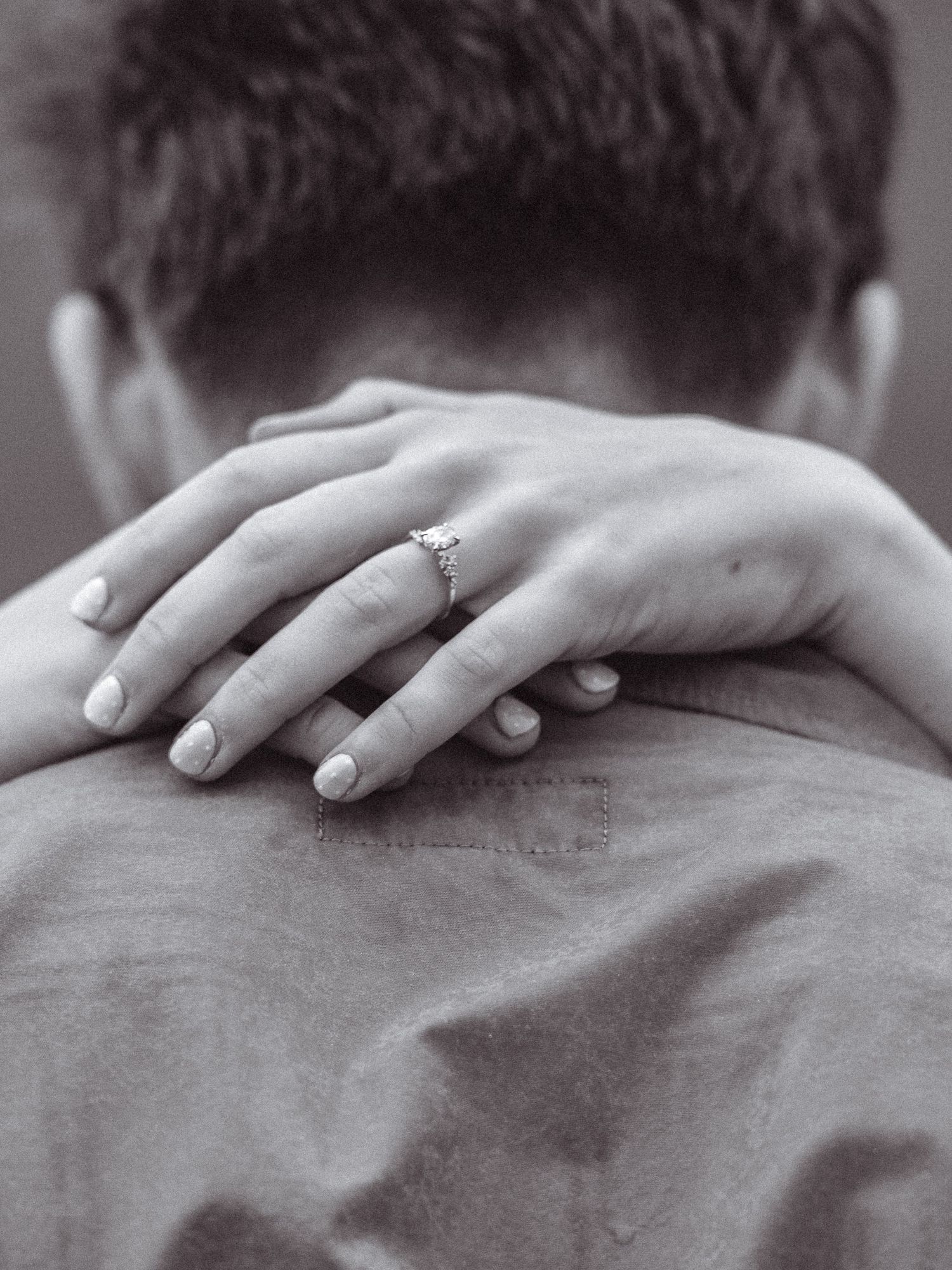 Black and white, editorial, cinematic engagement shoot. Engagement ring on hand photo. Engagement shoot, couples photographer.