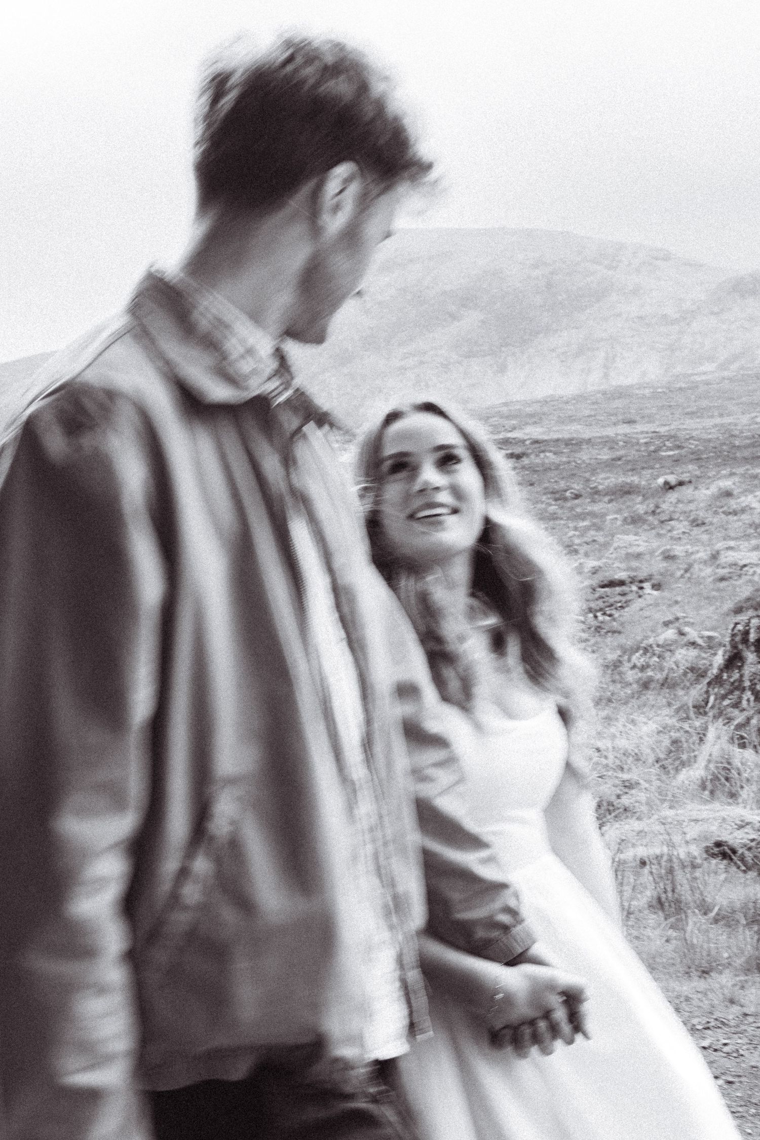 Black and white, editorial, cinematic engagement shoot. Couple walking photo. Engagement shoot, couples photographer.