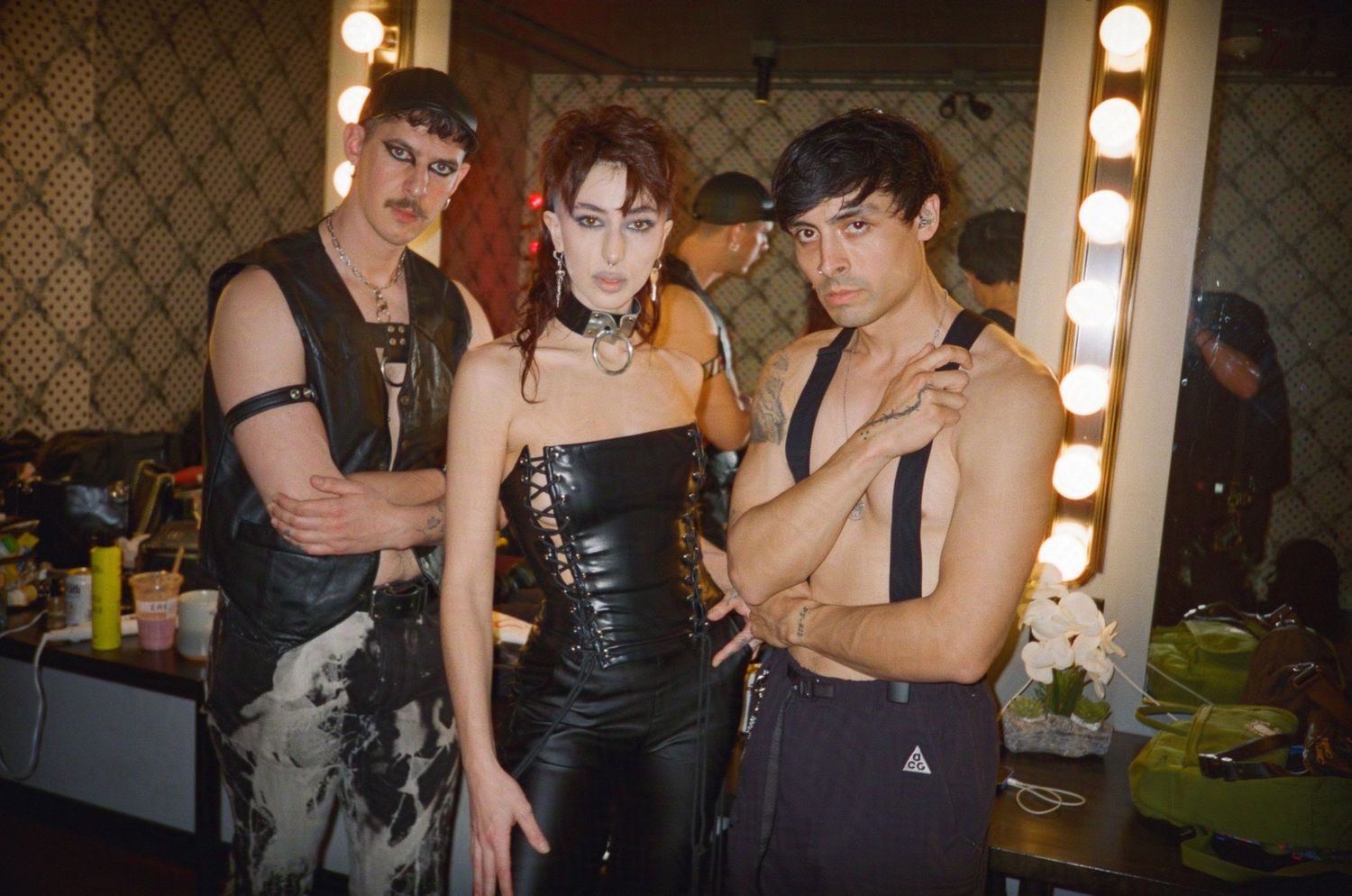 The band Pixel Grip poses for a group portrait in the green room. (Peaches Tour at The Bellwether)

35mm film photo
© snapnon 2026