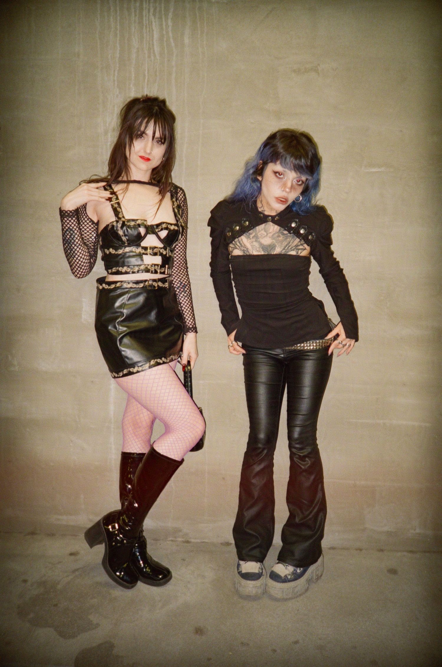 Violet and Alex pose for an outfit photo in the parking lot.

35mm film photo
© snapnon 2026