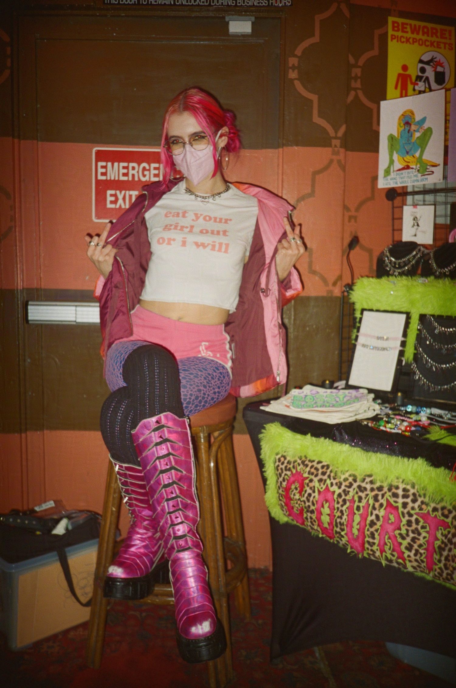 Artist Courtney's Cosmos shows off the important message on their tank top. (Akbar)

35mm film photo
© snapnon 2026