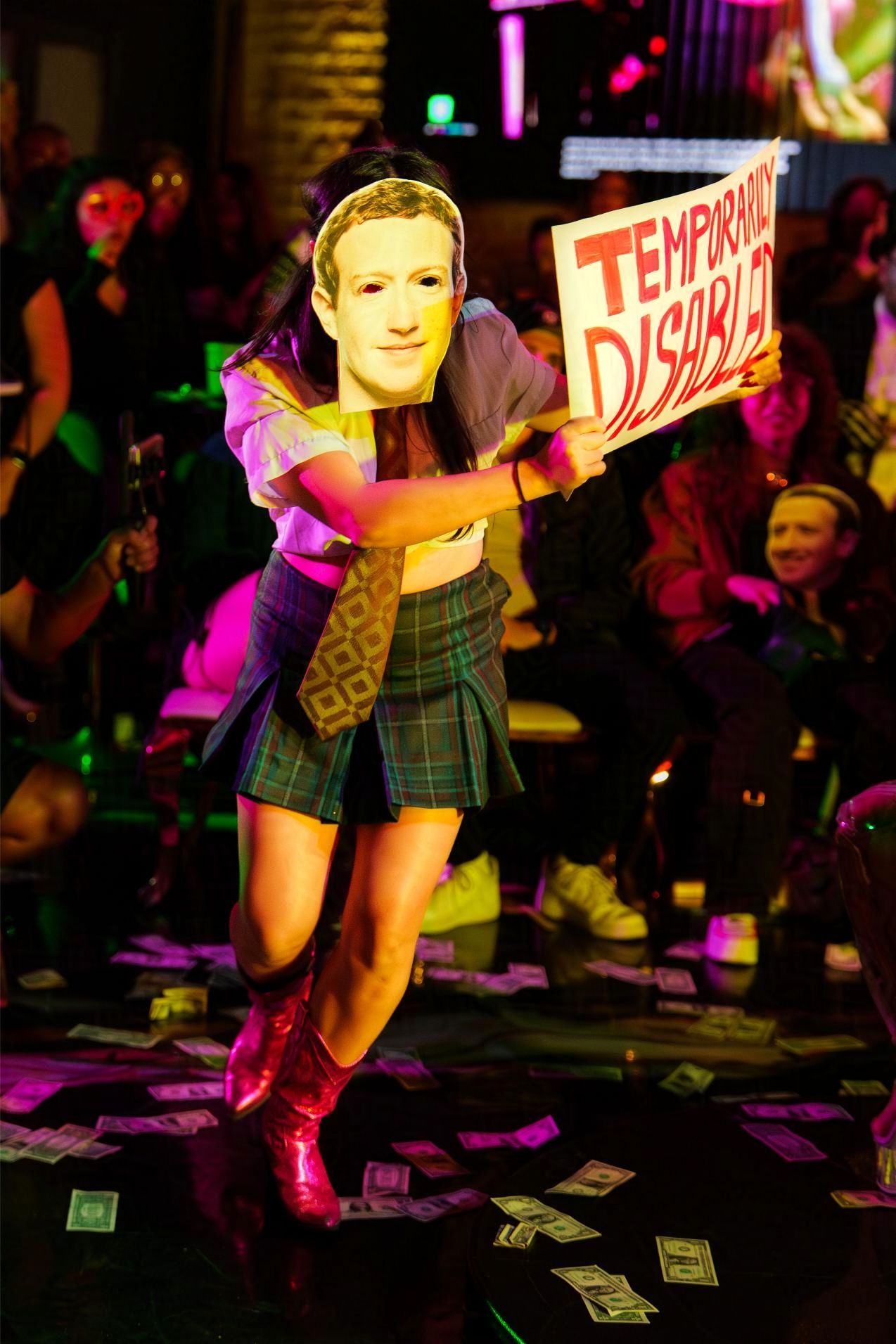 Riv puts on a performance as Zuckerberg at the Stripper Co-op show.

© snapnon 2026