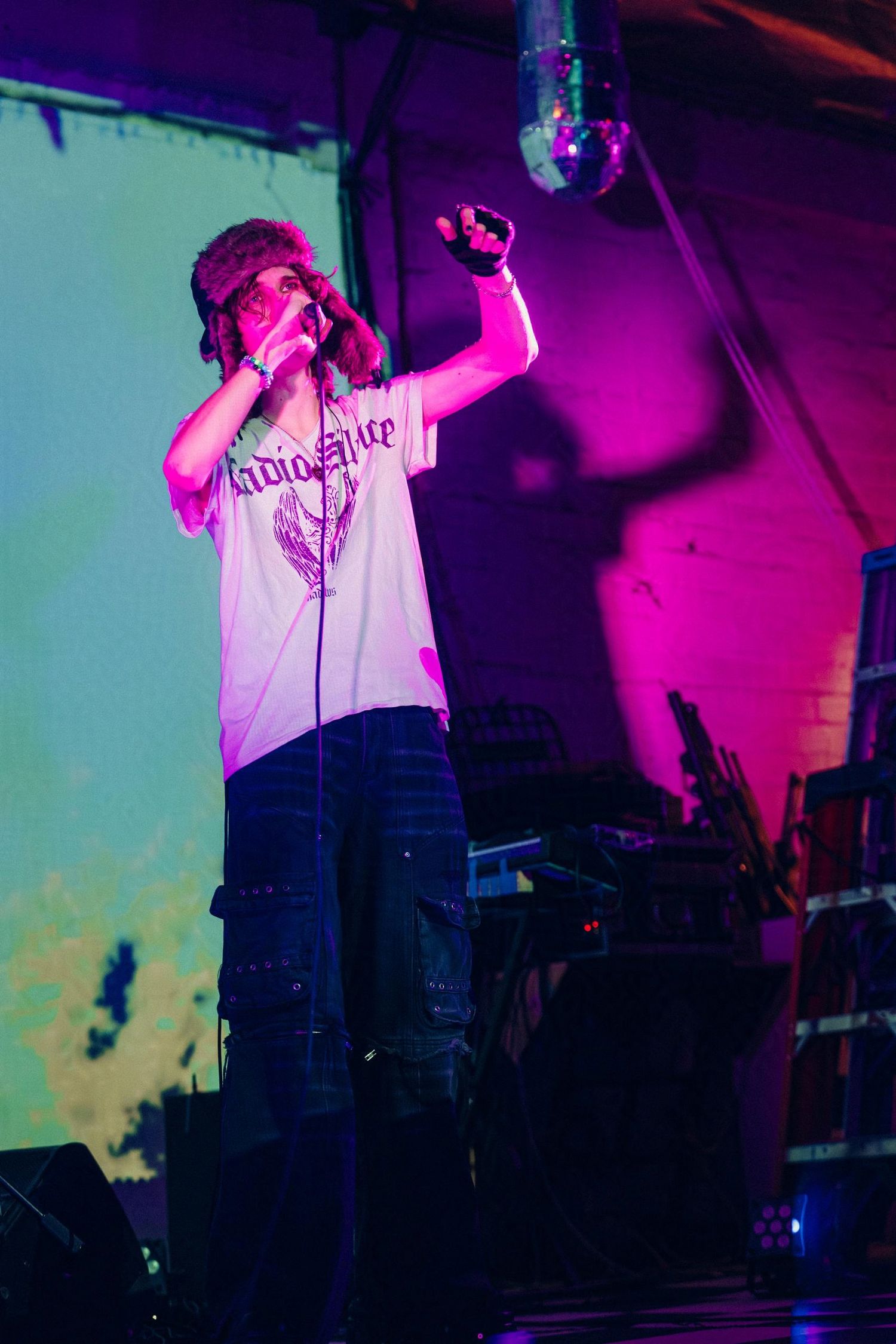 paracosm performs in dramatic lighting. (A/D/S/R at Non Plus Ultra)

© snapnon 2026