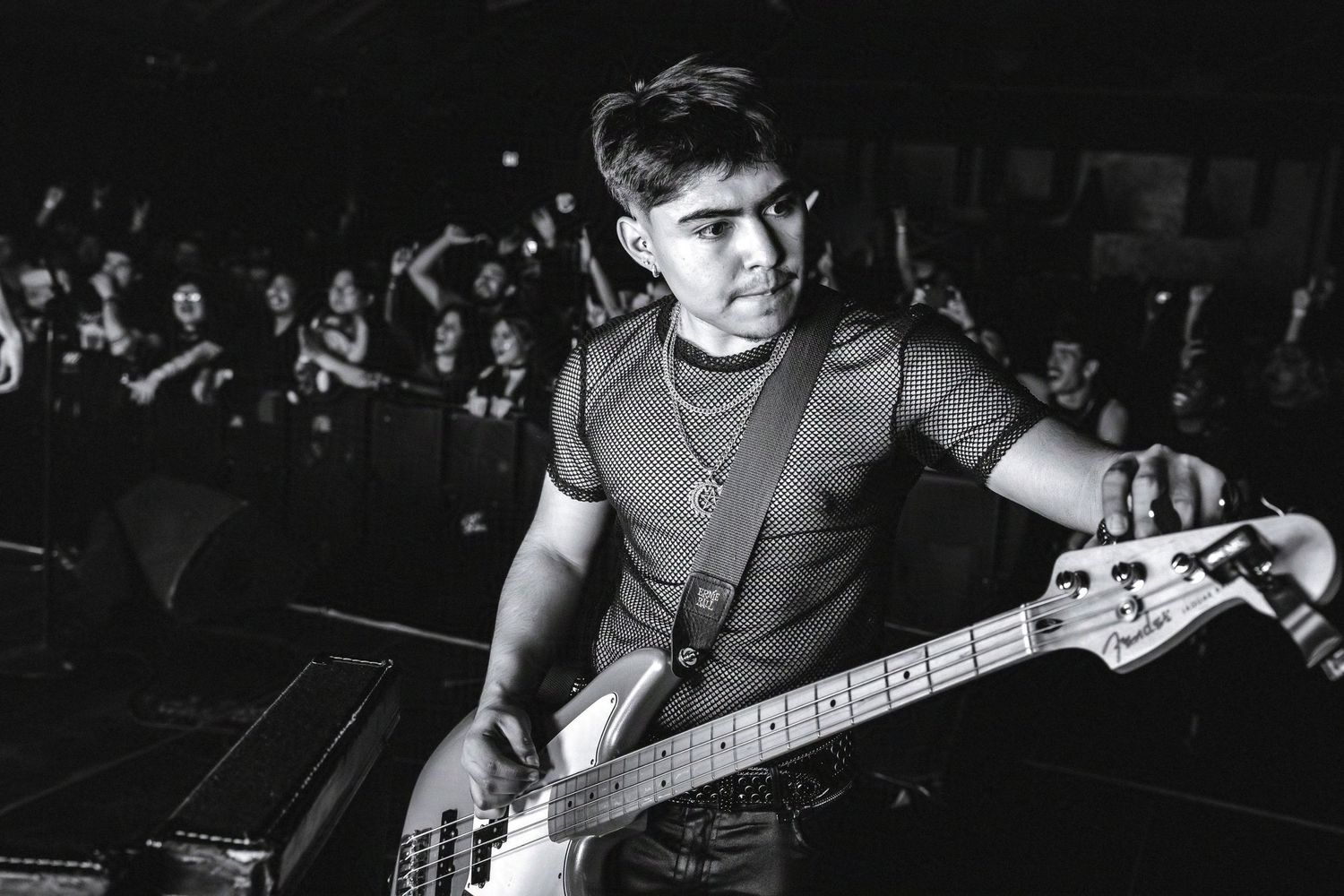 The bassist tunes up between songs at the Afterpunk 2077 Samurai Lives event at 1720.

© snapnon 2026