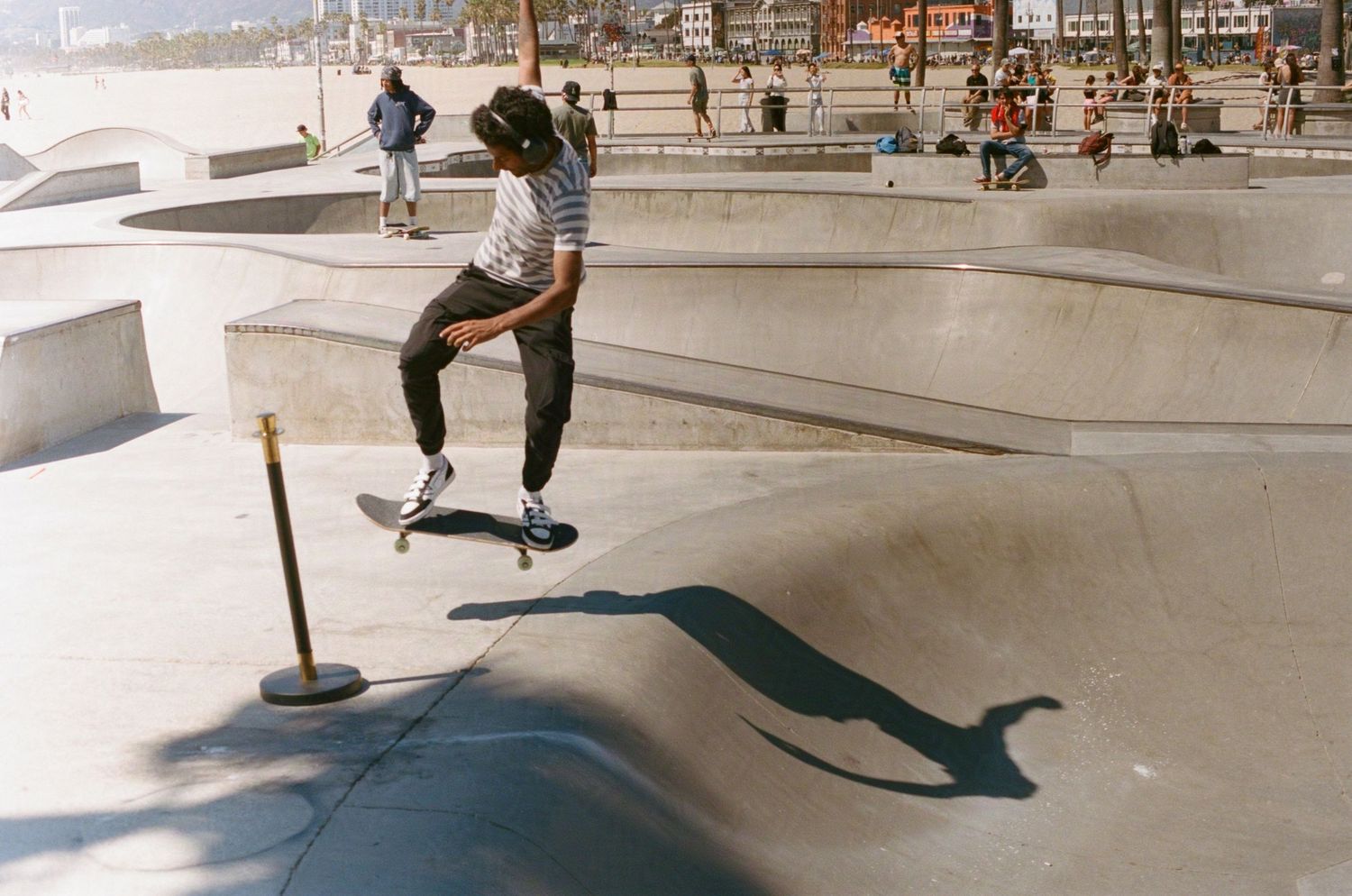 A skater gets a little bit of air. (Skate Park at Venice Beach)

35mm film photo
© snapnon 2026
