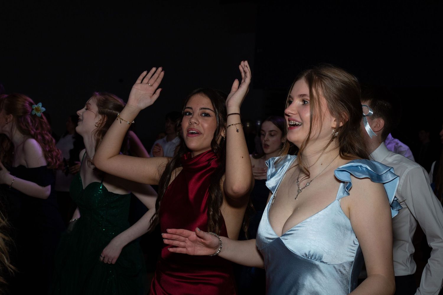 Girls dancing at a winter ball party event in the hall of a school in Edinburgh in colour.

Edinburgh Event Photographer.