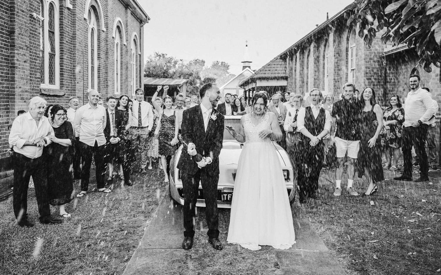 Maitland Valley Wedding Photography and champagne spray