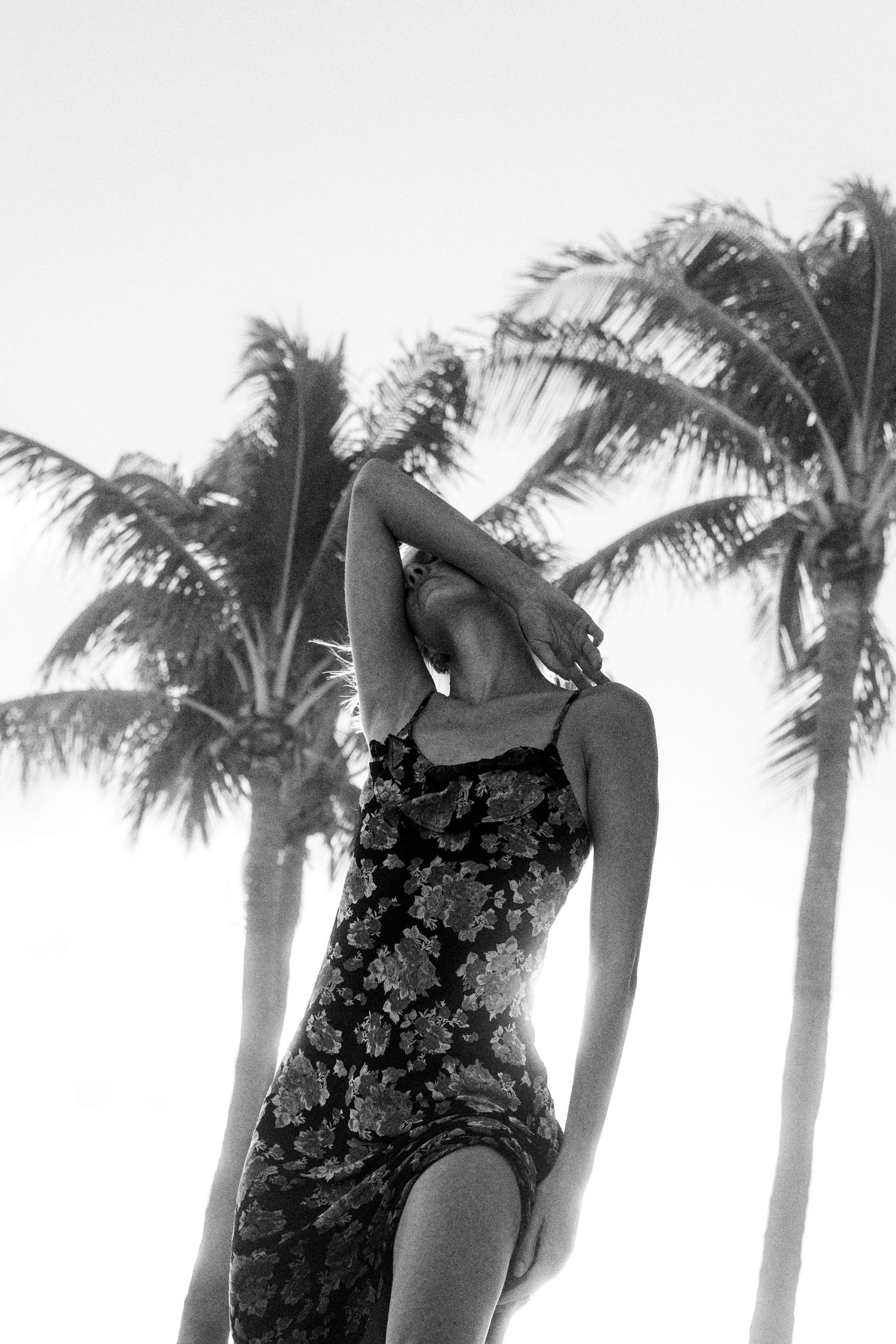 black and white high fashion photograph of high end female model posing on a beach in South Florida shot by commercial photographer
