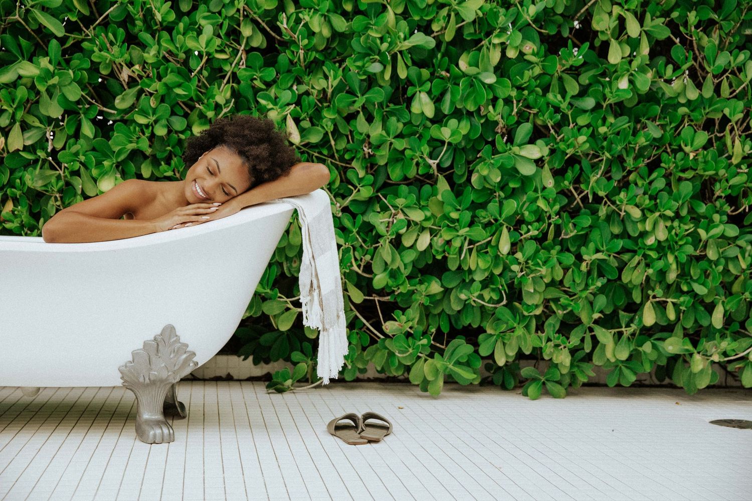 brand campaign photograph of girl relaxing in bathtub at The Standard in South Beach Miami