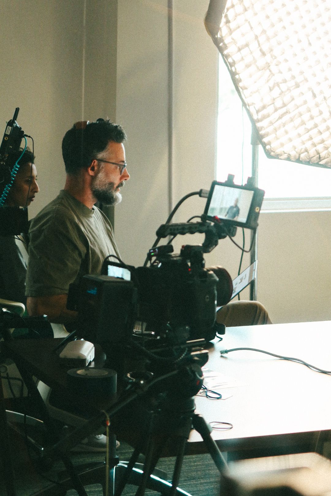 High end commercial video production team filming interviews of C-Level executives for a publicly traded company in South Florida.