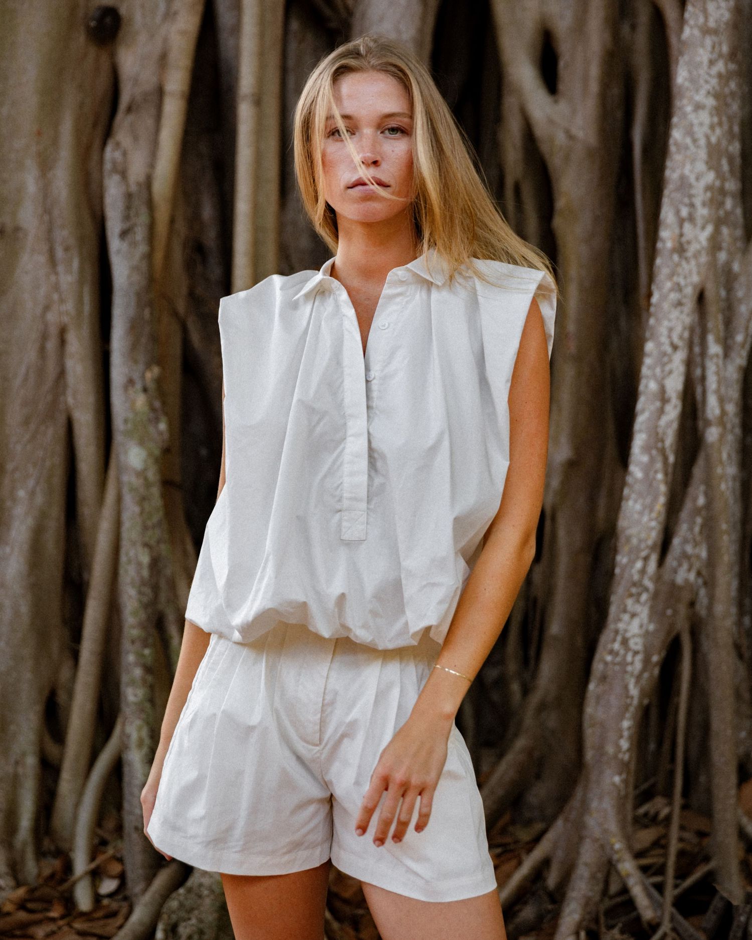 Fashion lifestyle photography featuring a model in minimalist resort wear captured in natural light in South Florida.