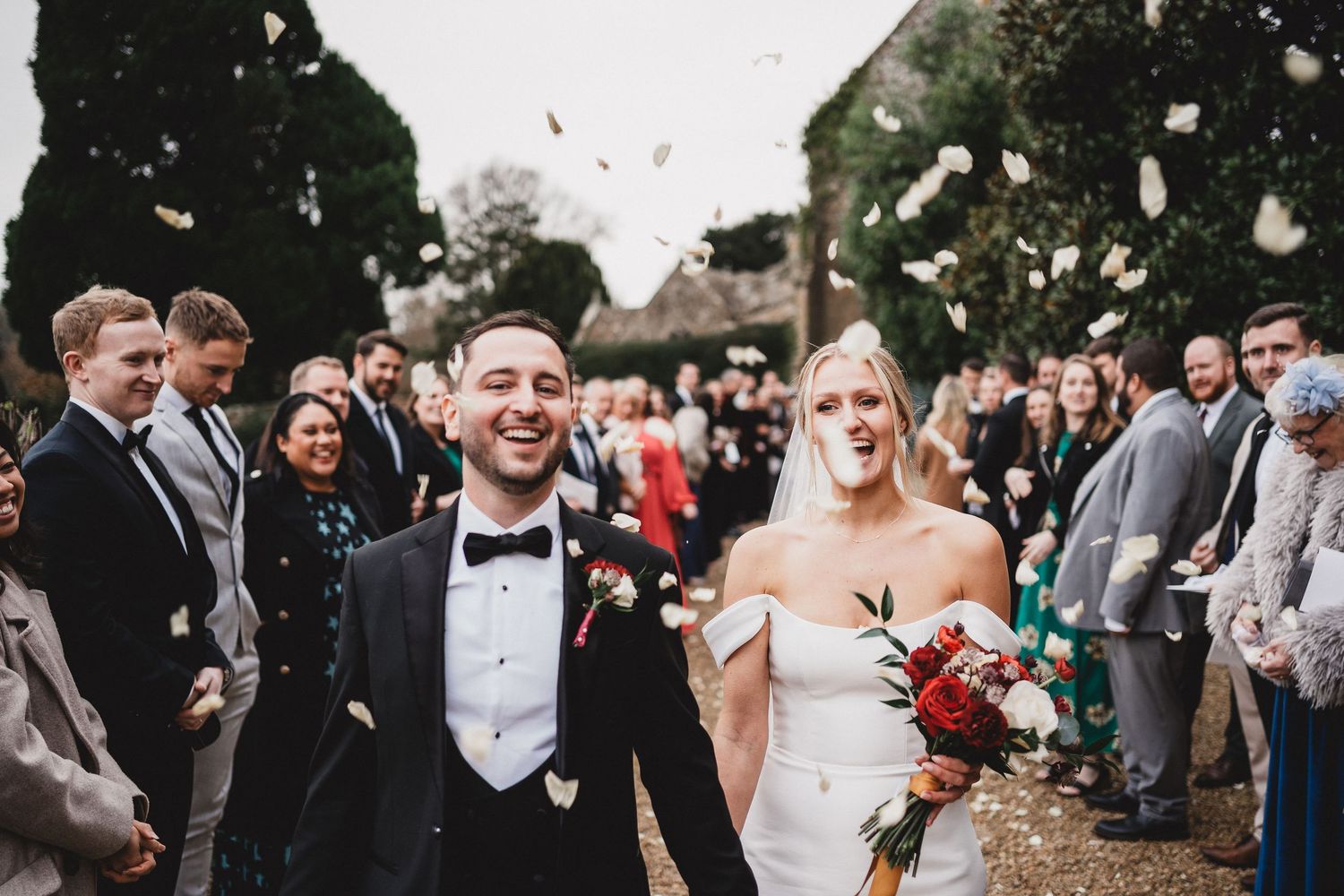 A series of candid wedding moments showing joyful celebrations and outdoor festivities with guests and newlyweds.