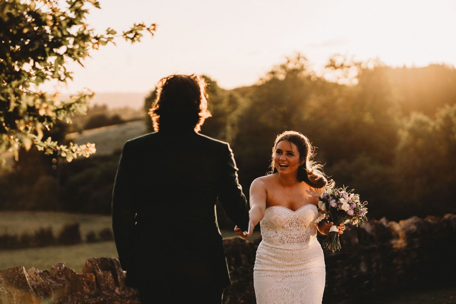married couple at golden hour