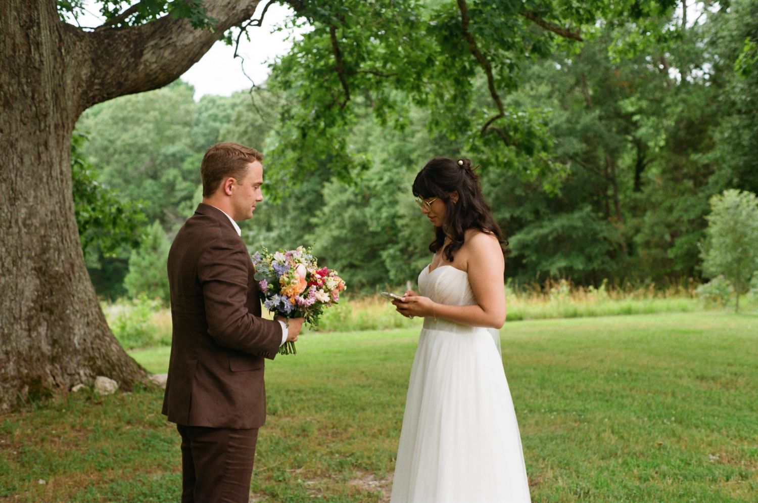 Outdoor intimate wedding ceremony with a colorful bouquet, at The Ivy Place on 35mm Film in Lancaster SC, Wedding Photographer 35mm Film