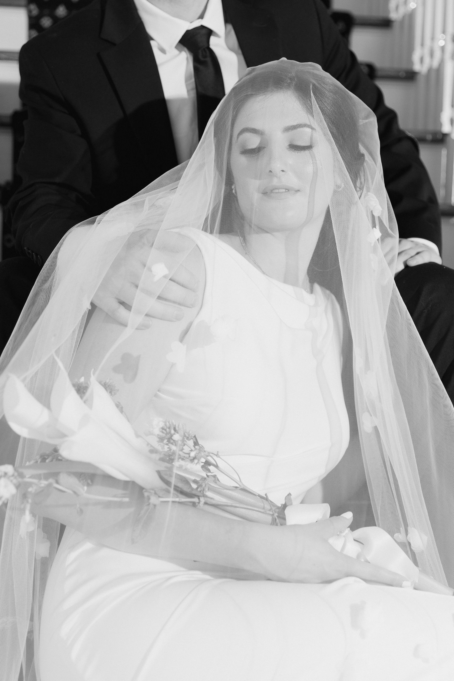Black and white artistic photo sequence showing bride in traditional veil at different angles during wedding ceremony in Raleigh NC