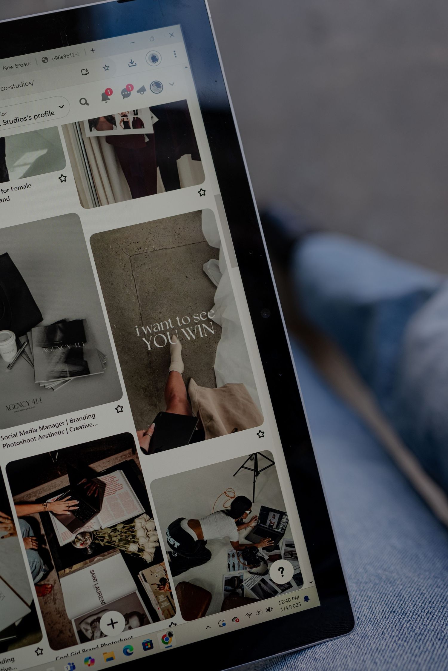 Tablet screen displaying Pinterest-style mood board interface with various image tiles.
