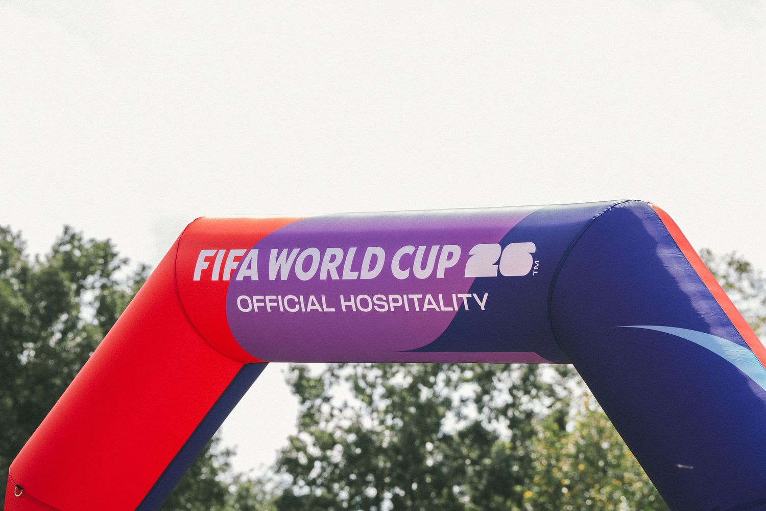FIFA World Cup 26 Official Hospitality inflatable arch outdoors.