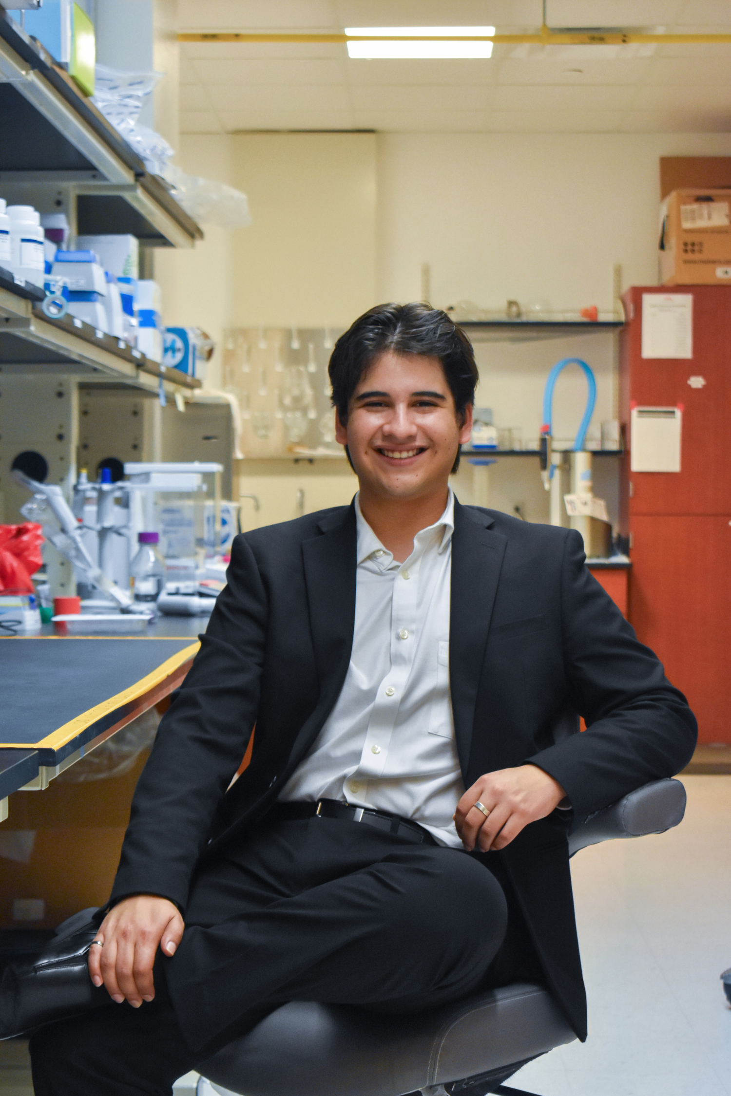 UTSA graduation portrait in campus research laboratory in San Antonio