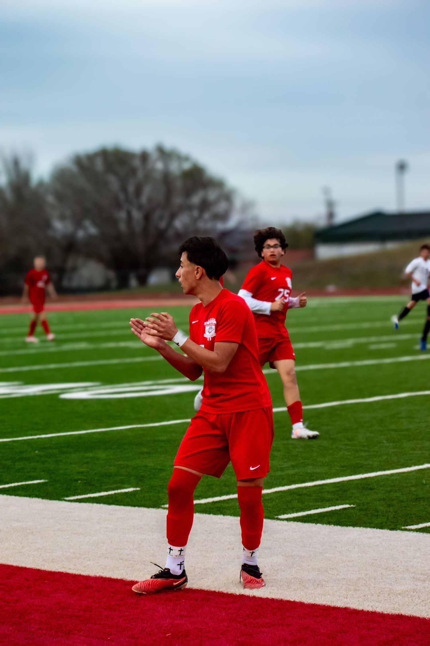 Athlete clapping at his teammates
