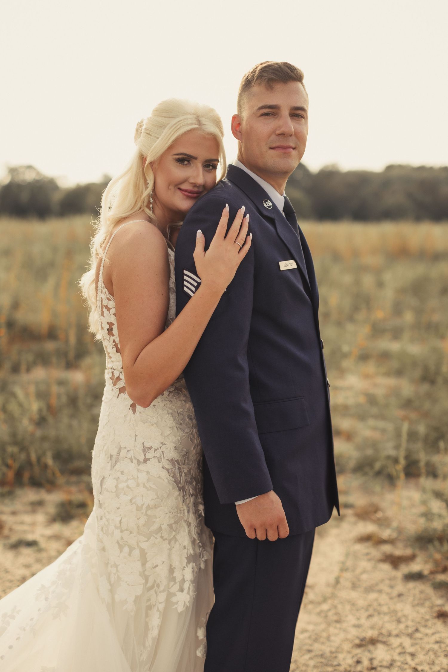 A series of romantic wedding photos showing a couple in formal attire posing together in a sunlit field.