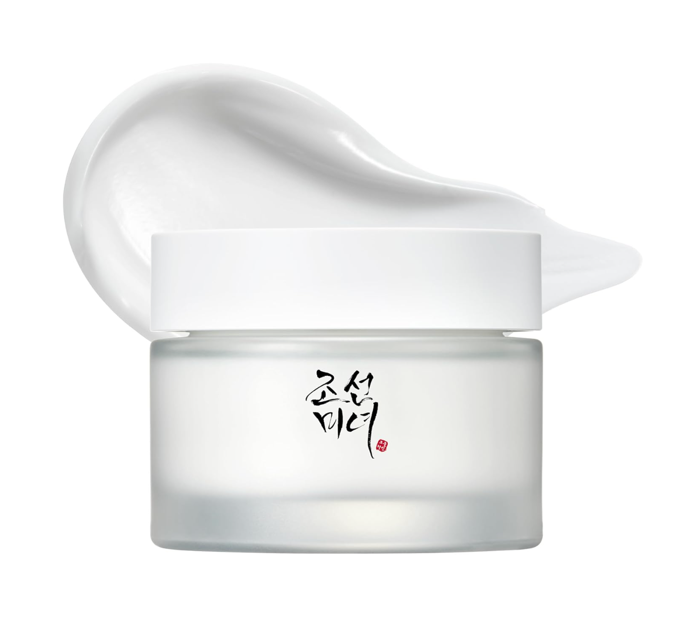 White Korean beauty cream with minimal branding in a frosted glass jar showing texture.