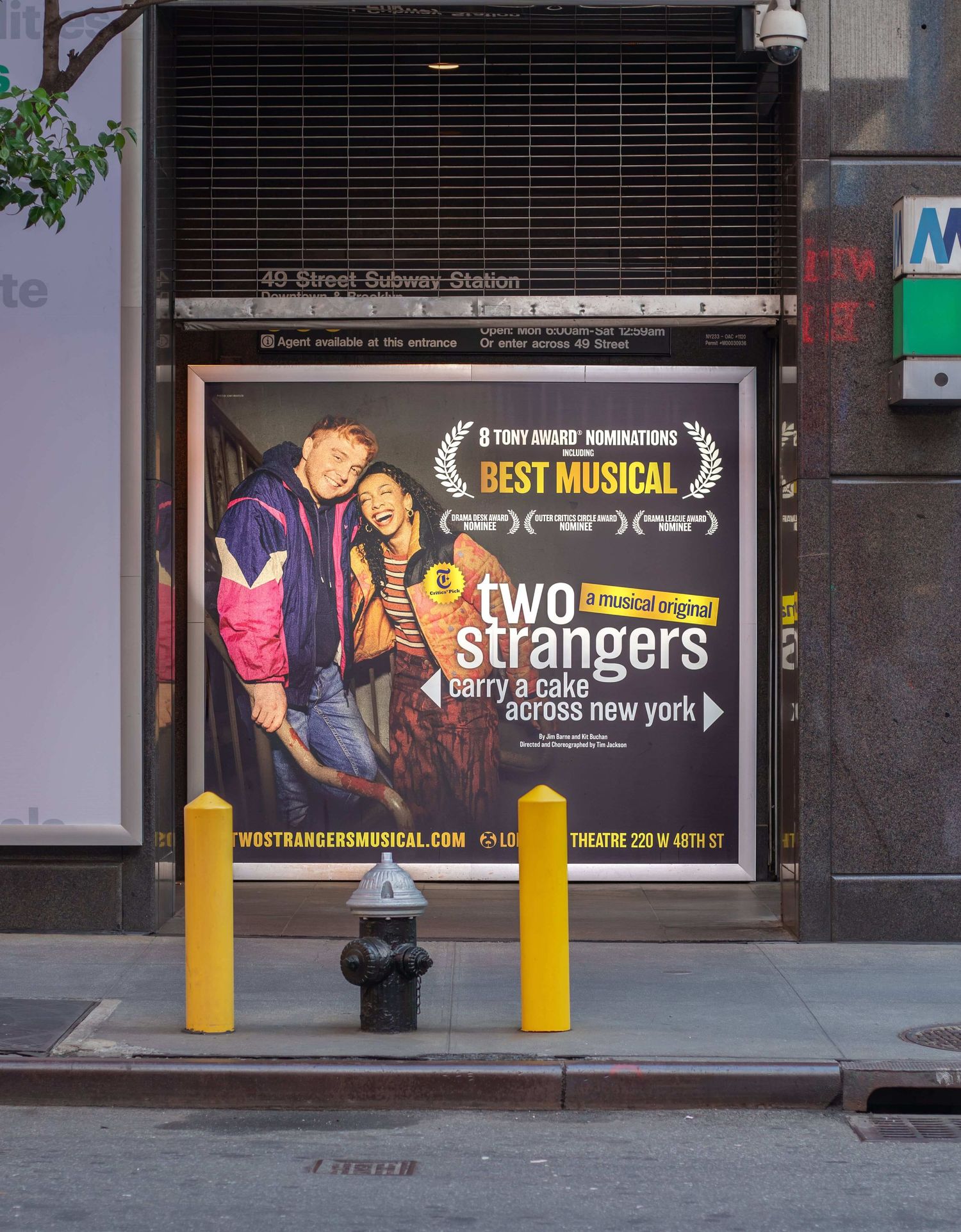 Billboard on 49th St for Two Strangers (Carry a Cake Across New York)