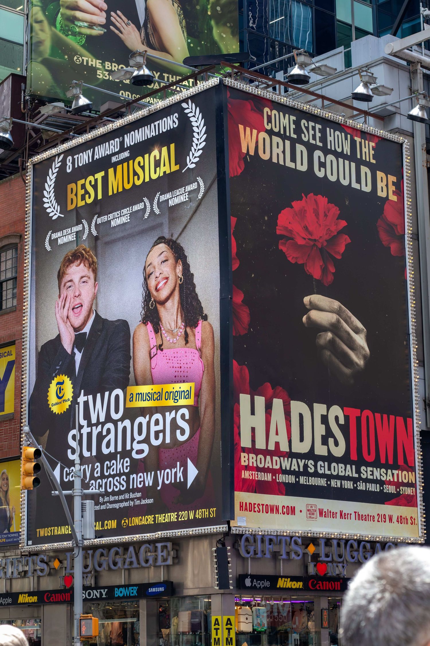 Billboard on 46th St for Two Strangers (Carry a Cake Across New York)
