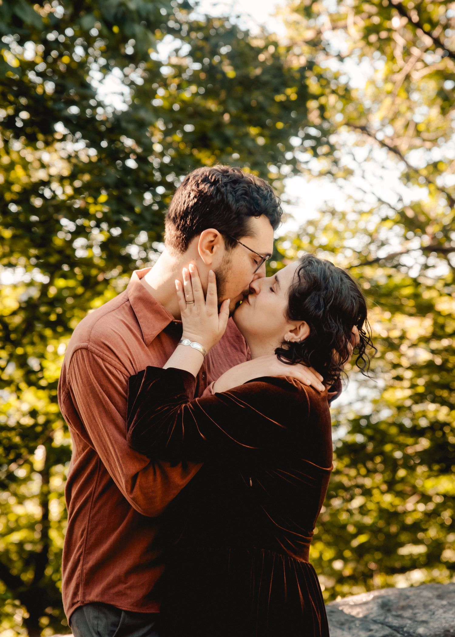 A couple kissing during their engagement photoshoot in New York City