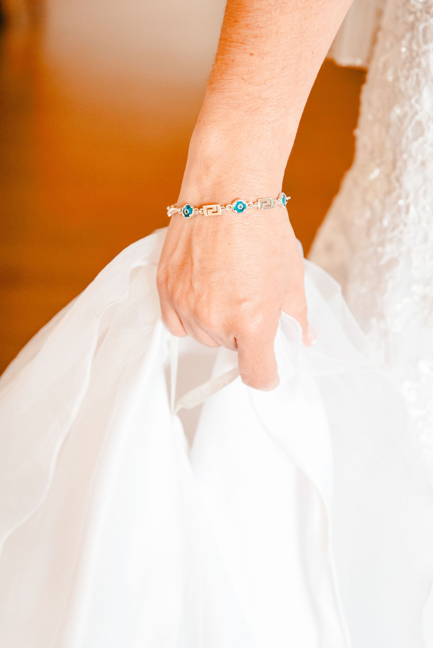 A close up of the bride's jewelry as she gets ready for her wedding day at Traditions Hotel & Spa Johnson City in Johnson City, NY.
