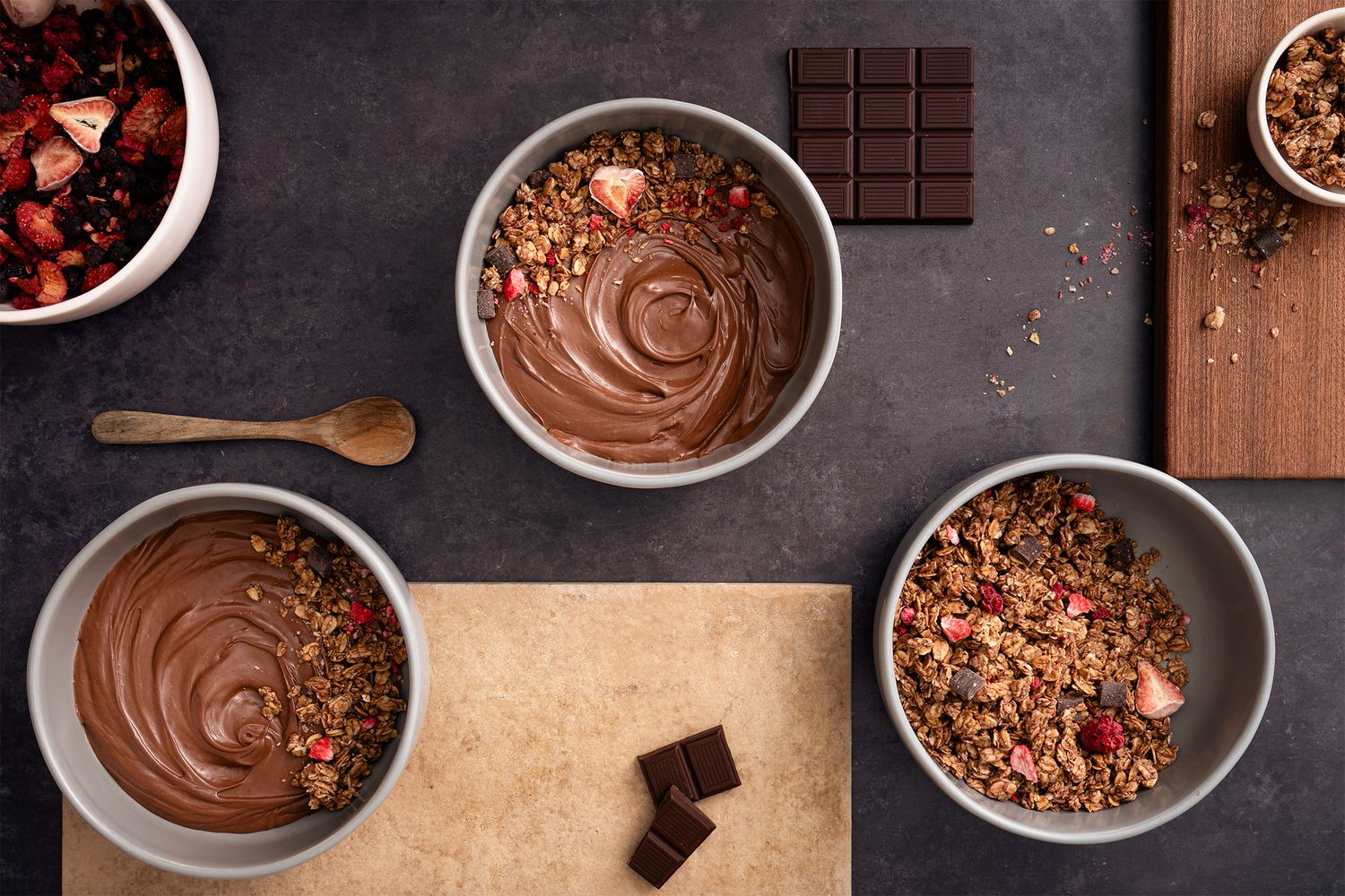 Red and pink freeze-dried fruits add pops of colour and break up the monotony of brown and beige, allowing the eye the flow throughout the image.
